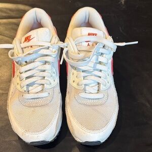 Nike White Sneakers with Coral Swoosh Accents